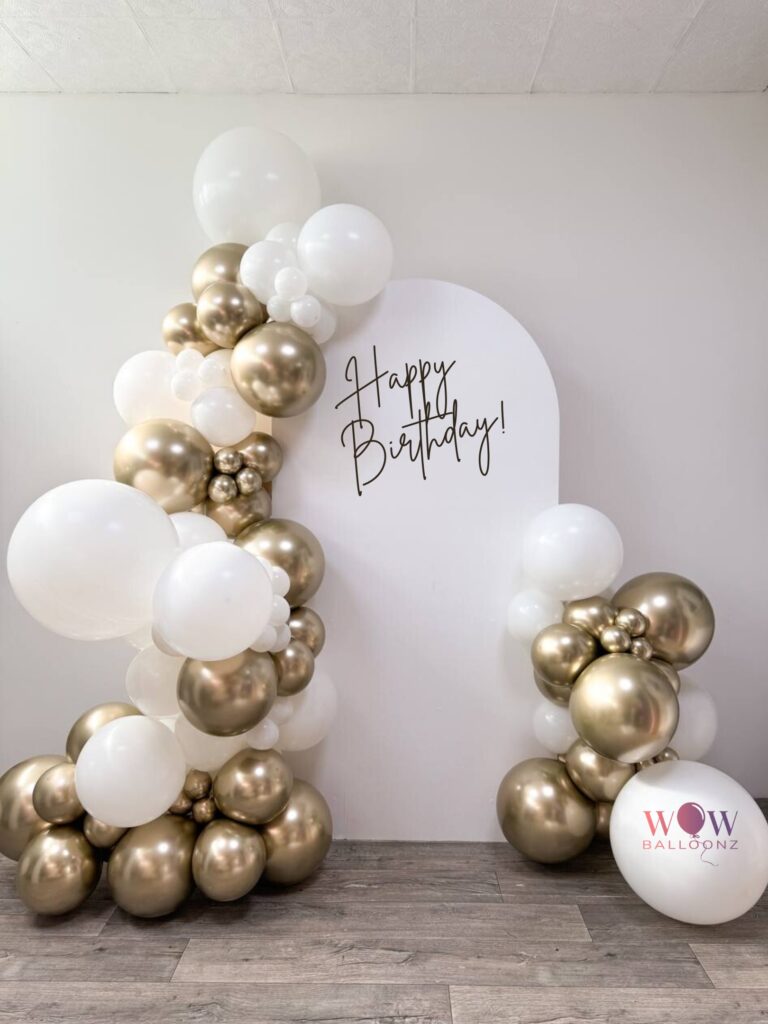 Happy Birthday Balloon Garland with arch backdrop